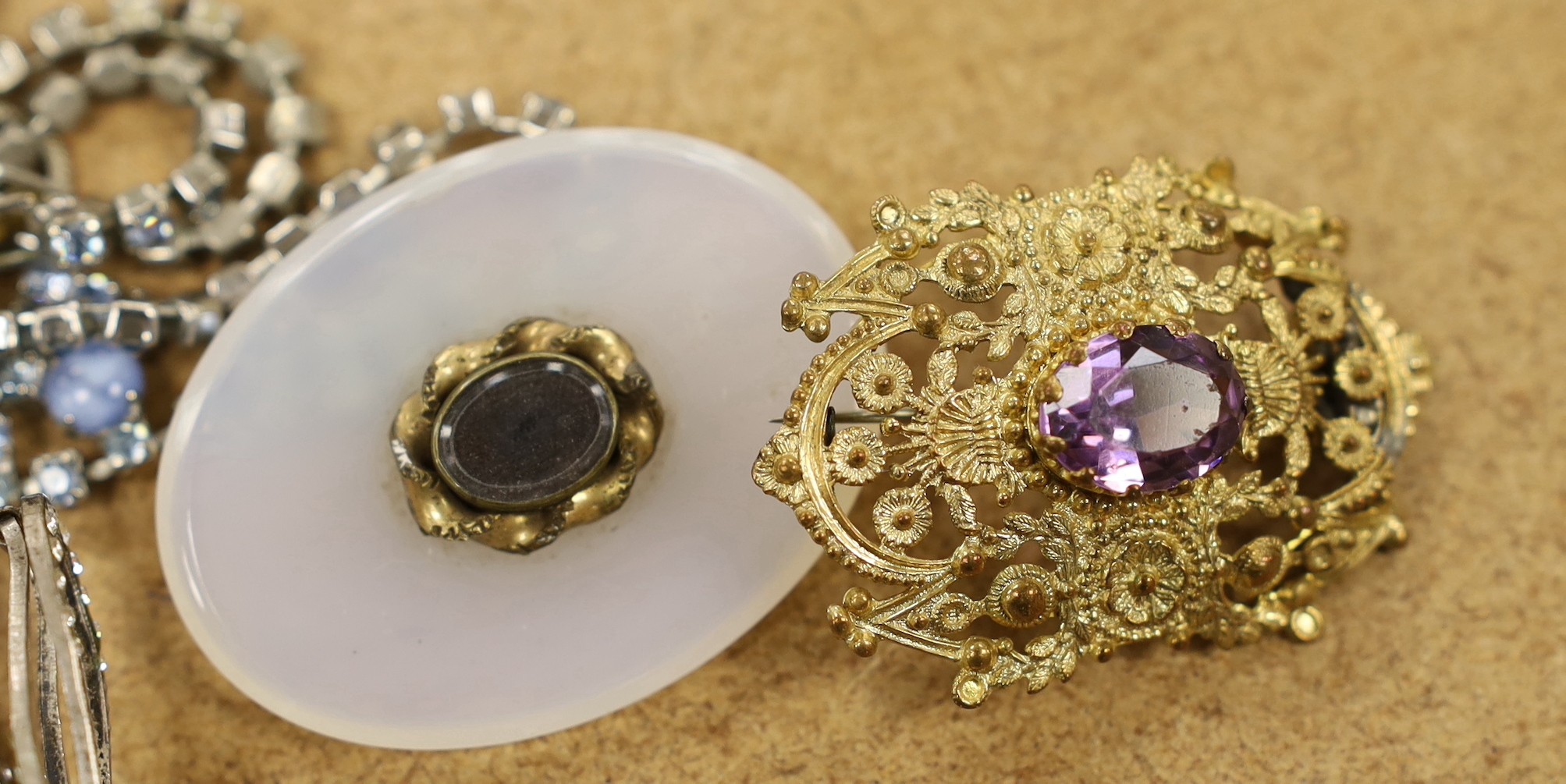 A late Victorian 15ct and gem set dress ring, a 9ct gem and seed pearl set pendant, a 9ct and seed pearl set brooch and a quantity of other assorted jewellery.